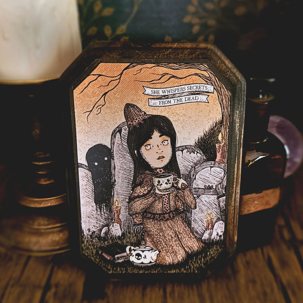 Victorian orphan girl with cemetery tea party wood plaque on hand-stained dark wood, She Whispers Secrets from the Dead