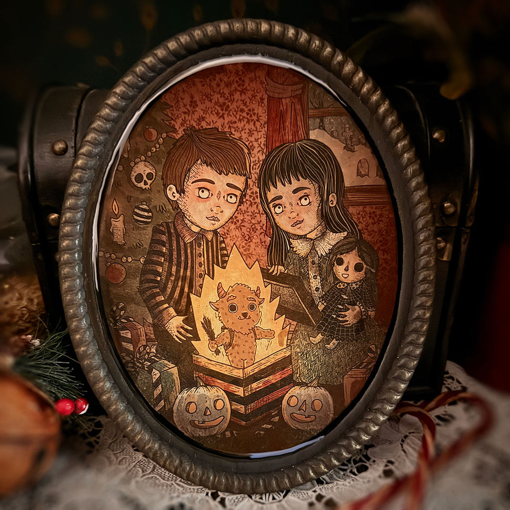 Illustration of two children with a creature inside a box, framed in a dark, ornate border.